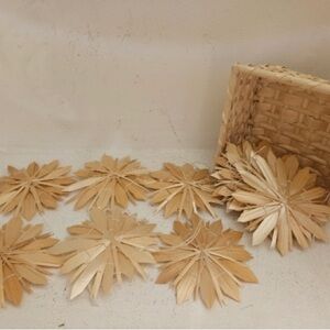 Scandinavian straw star ornaments in original straw basket